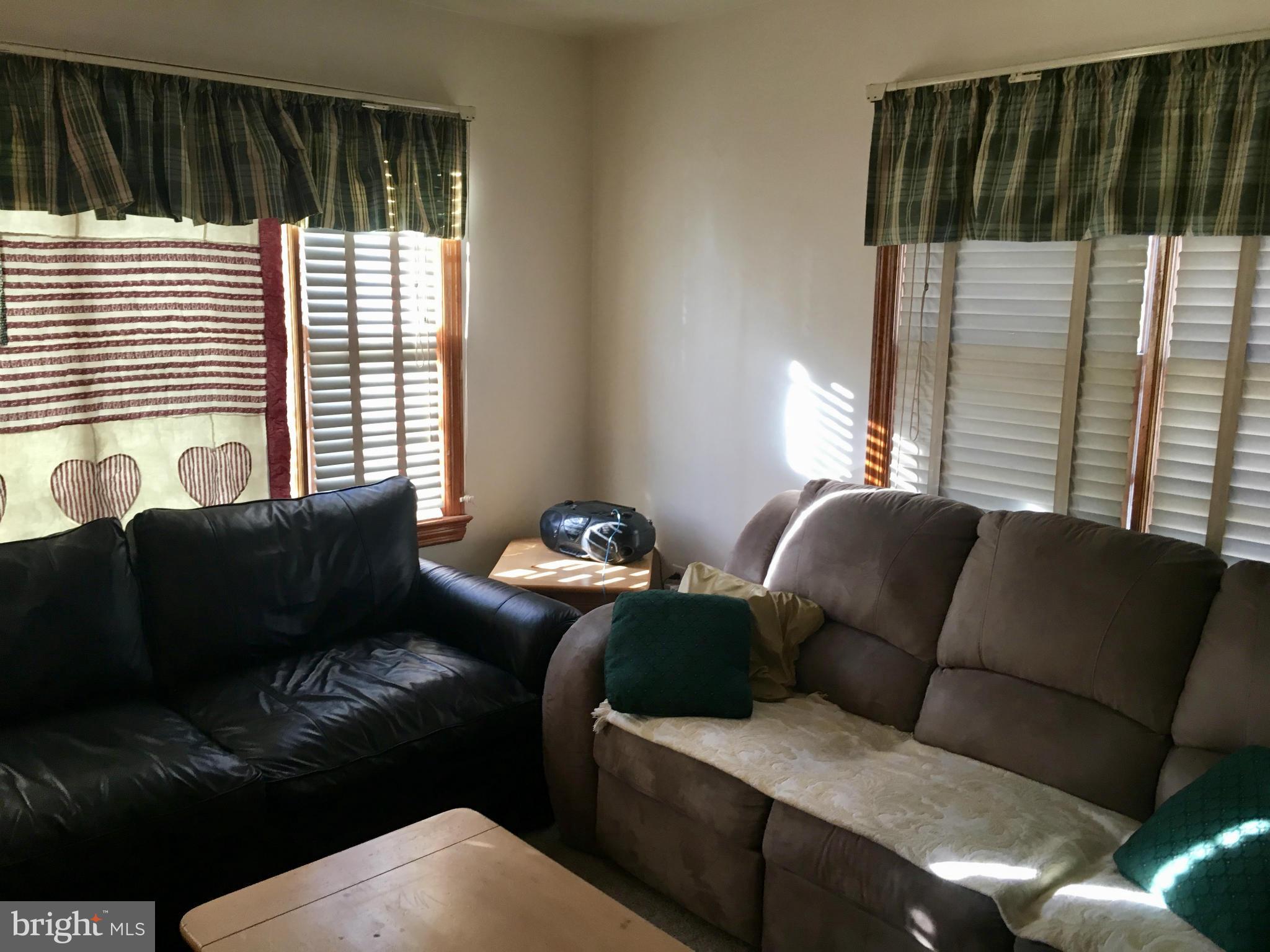 348 Nottingham Road Hagerstown, MD 21740 - Photo 3 of 8 a living room with furniture and a window