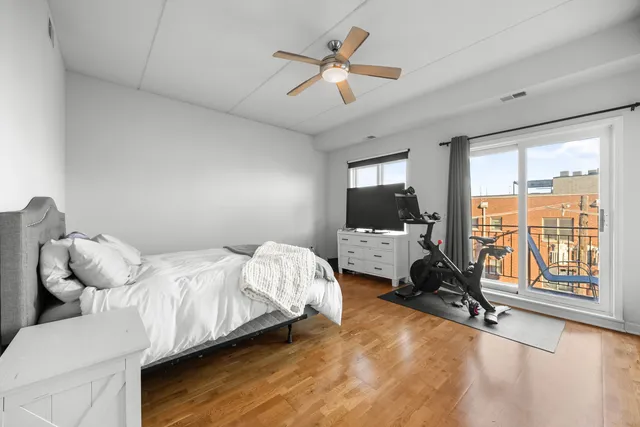 a bed room with bed and a window