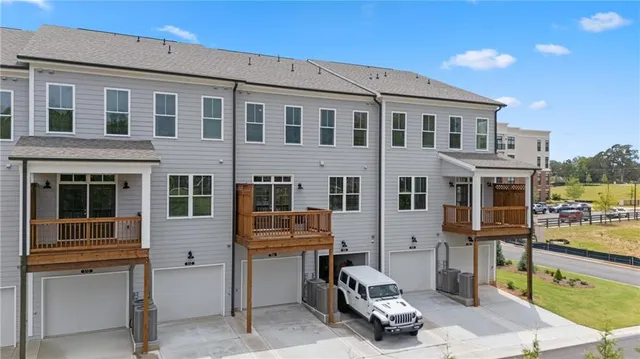 a front view of a building with many windows