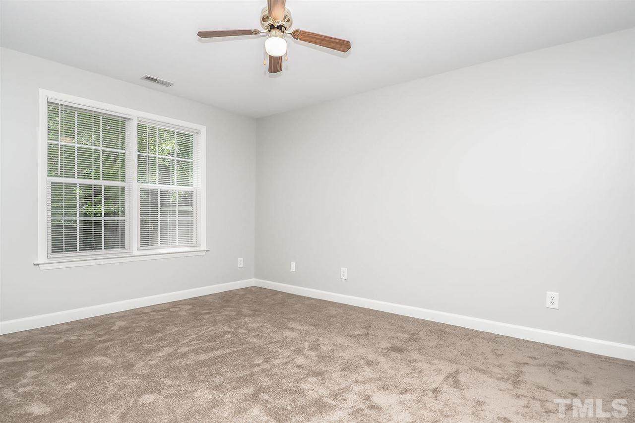 3121 Stedman Drive Raleigh, NC 27607 - Photo 16 of 25 an empty room with a window