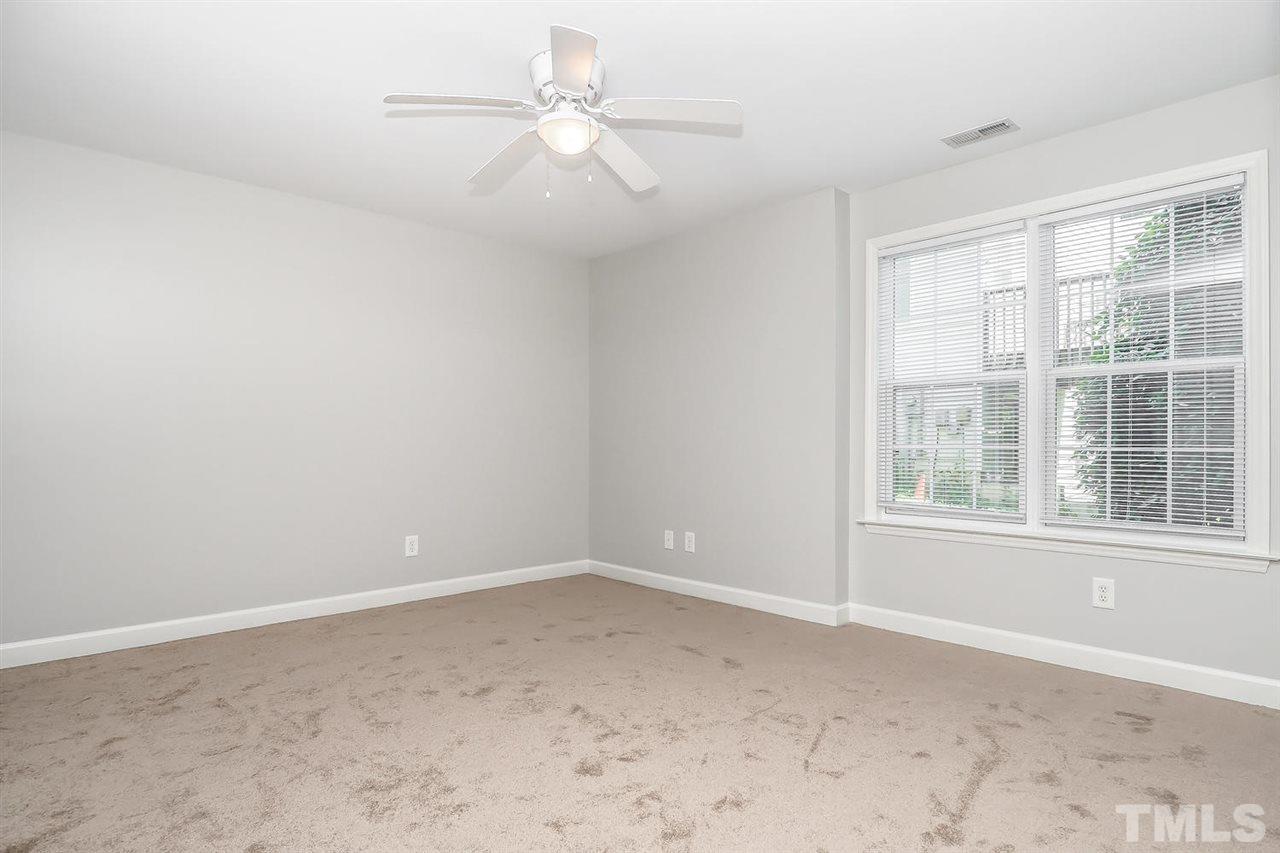 3121 Stedman Drive Raleigh, NC 27607 - Photo 20 of 25 an empty room with a window