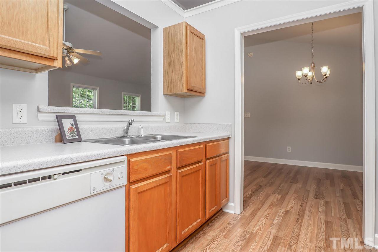 3121 Stedman Drive Raleigh, NC 27607 - Photo 10 of 25 a bathroom with a sink and a mirror