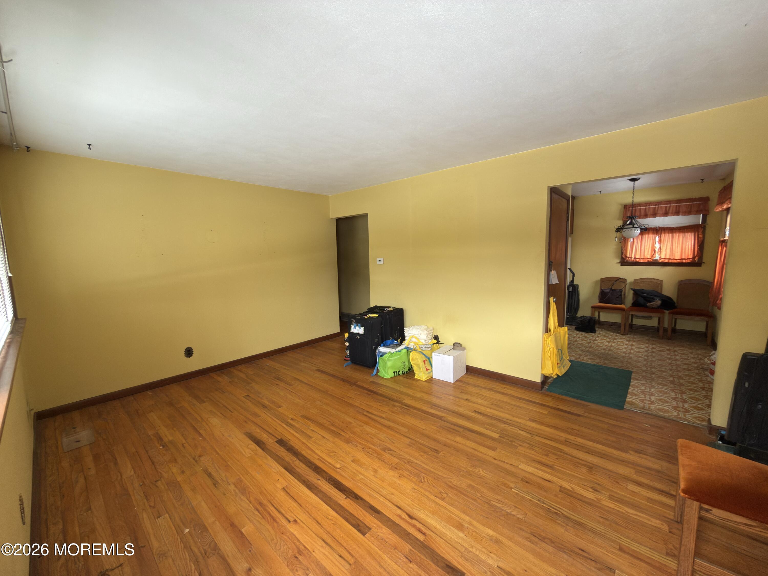 325 Sharon Road Hightstown, NJ 08520 - Photo 3 of 13 a bedroom with a bed and a flat screen tv