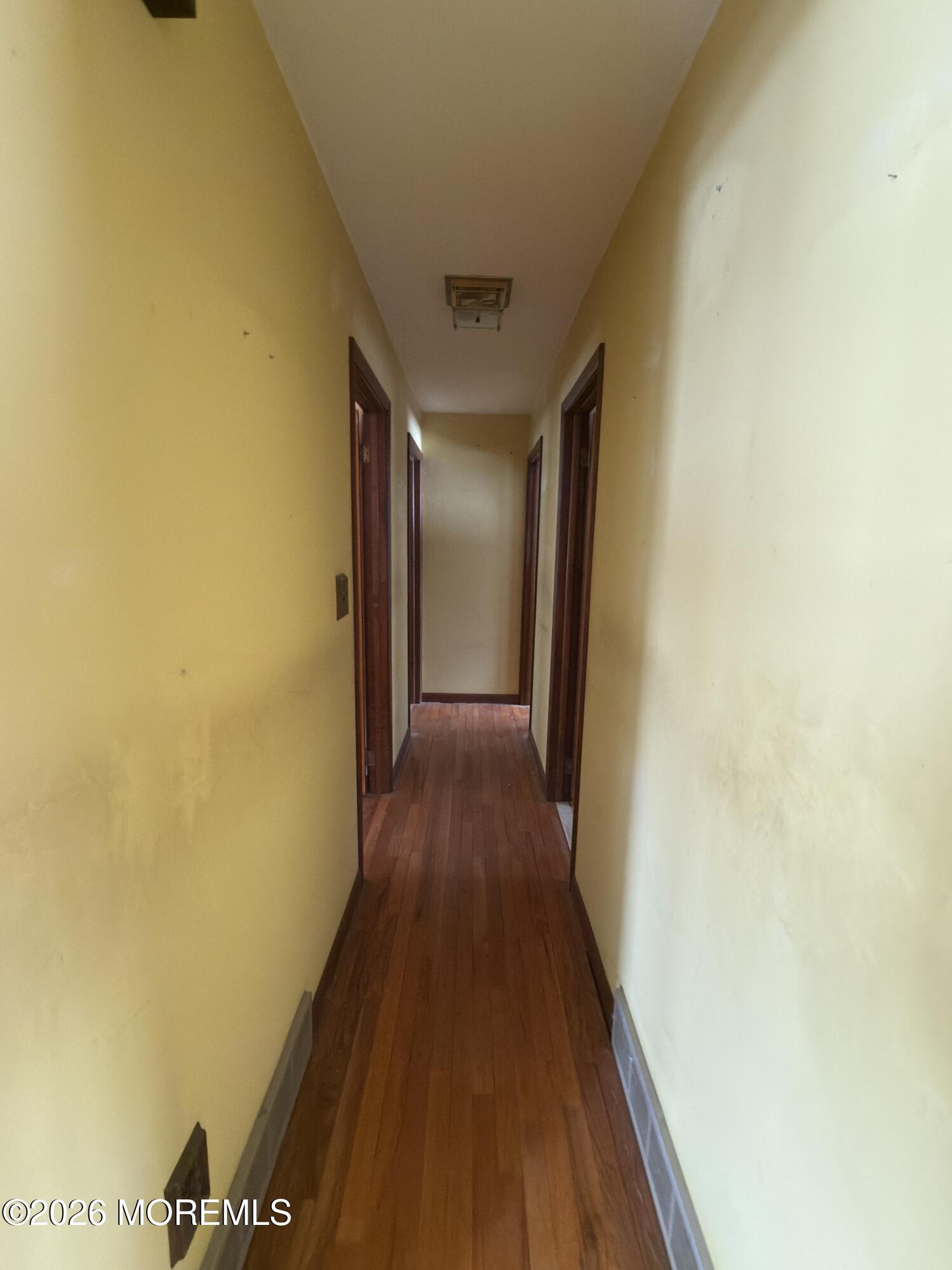 325 Sharon Road Hightstown, NJ 08520 - Photo 6 of 13 a view of a hallway with wooden floor