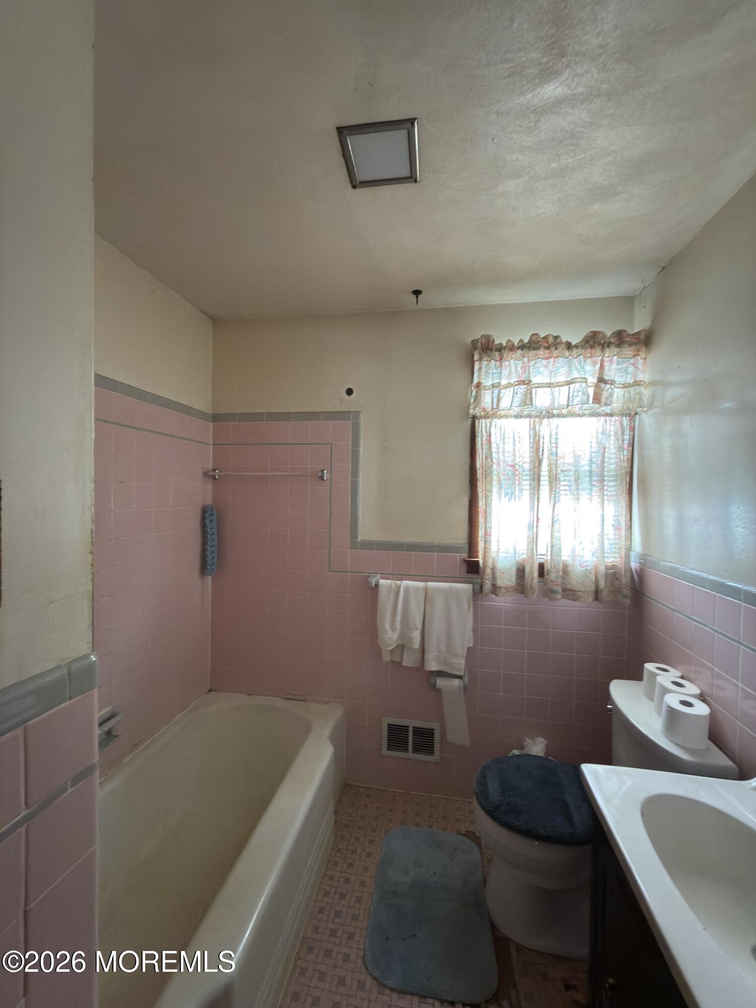 325 Sharon Road Hightstown, NJ 08520 - Photo 7 of 13 a bathroom with a sink a toilet and shower