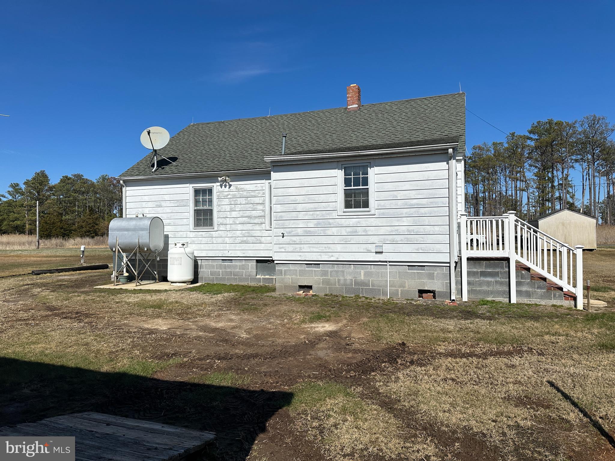 2775 Toddville Road Toddville, MD 21672 - Photo 2 of 59 a front view of a house with a yard