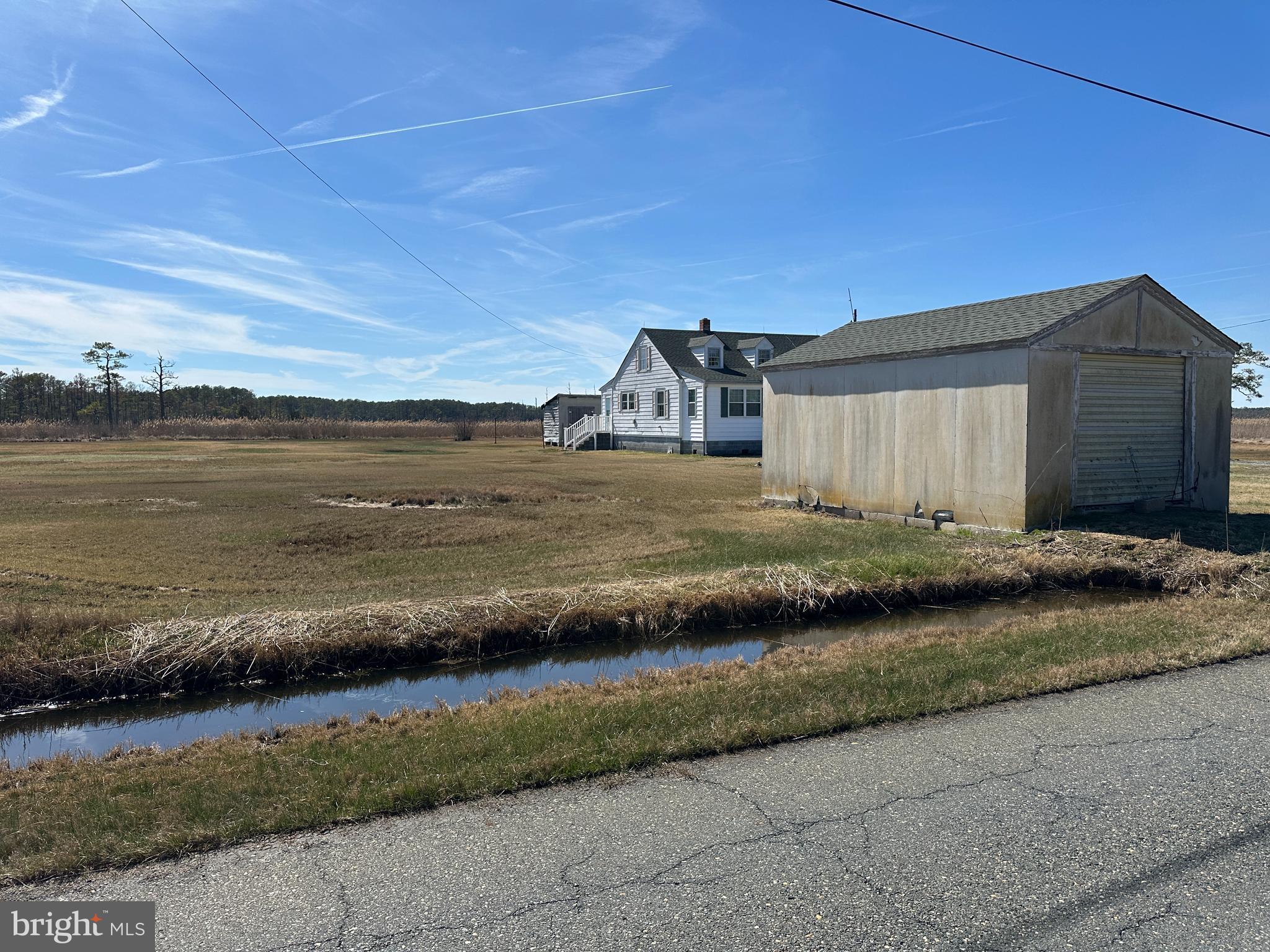 2775 Toddville Road Toddville, MD 21672 - Photo 3 of 59 a view of a terrace with a lake