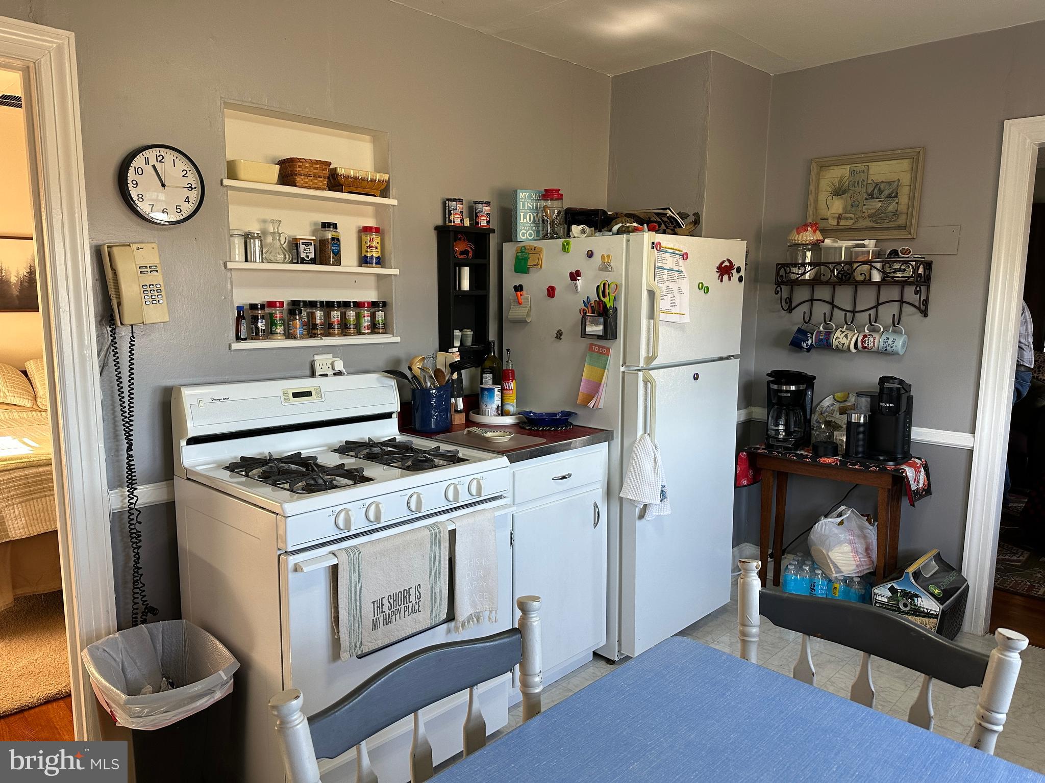 2775 Toddville Road Toddville, MD 21672 - Photo 52 of 59 a kitchen with stainless steel appliances a stove a refrigerator and a refrigerator