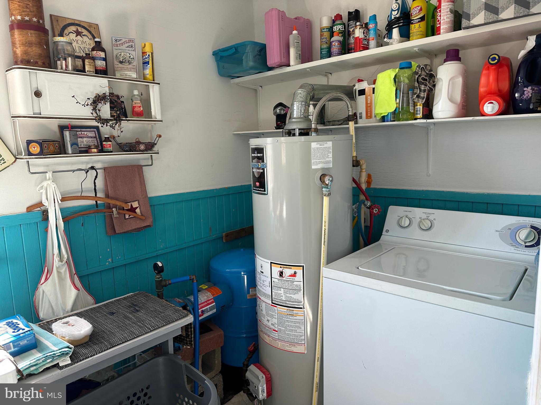 2775 Toddville Road Toddville, MD 21672 - Photo 53 of 59 a view of storage and utility room with washer and dryer