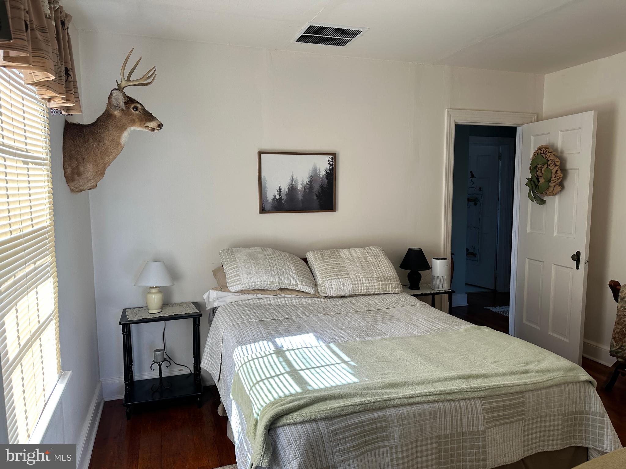 2775 Toddville Road Toddville, MD 21672 - Photo 56 of 59 a bedroom with a bed and a window
