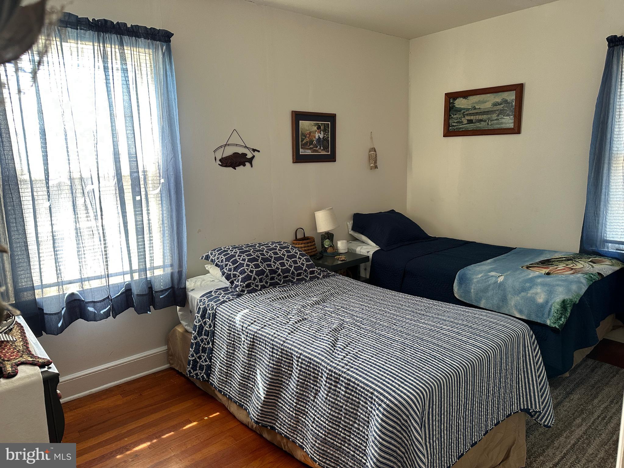 2775 Toddville Road Toddville, MD 21672 - Photo 57 of 59 a bedroom with two beds and a couch