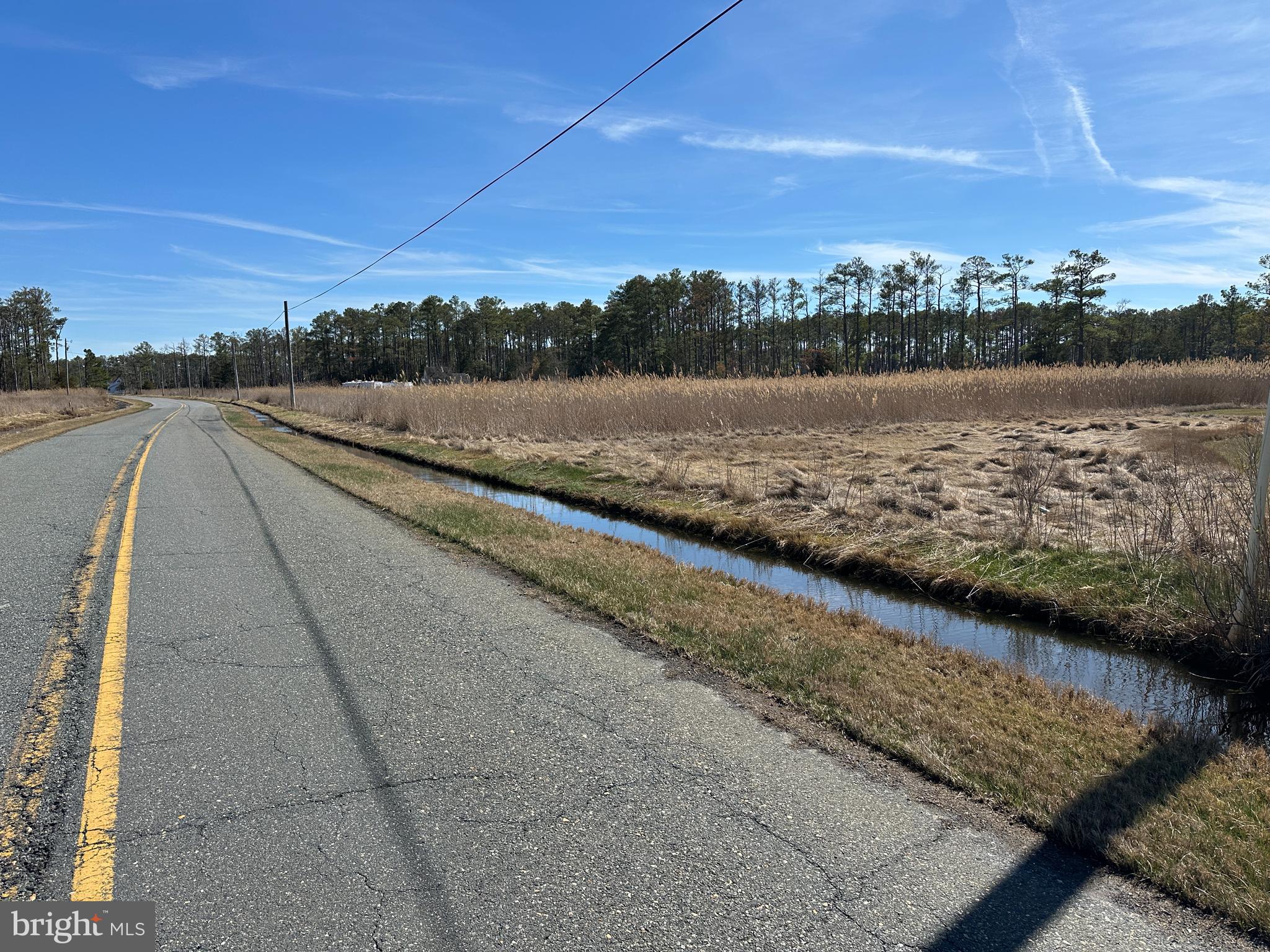 2775 Toddville Road Toddville, MD 21672 - Photo 7 of 59 a view of a lake with a city view