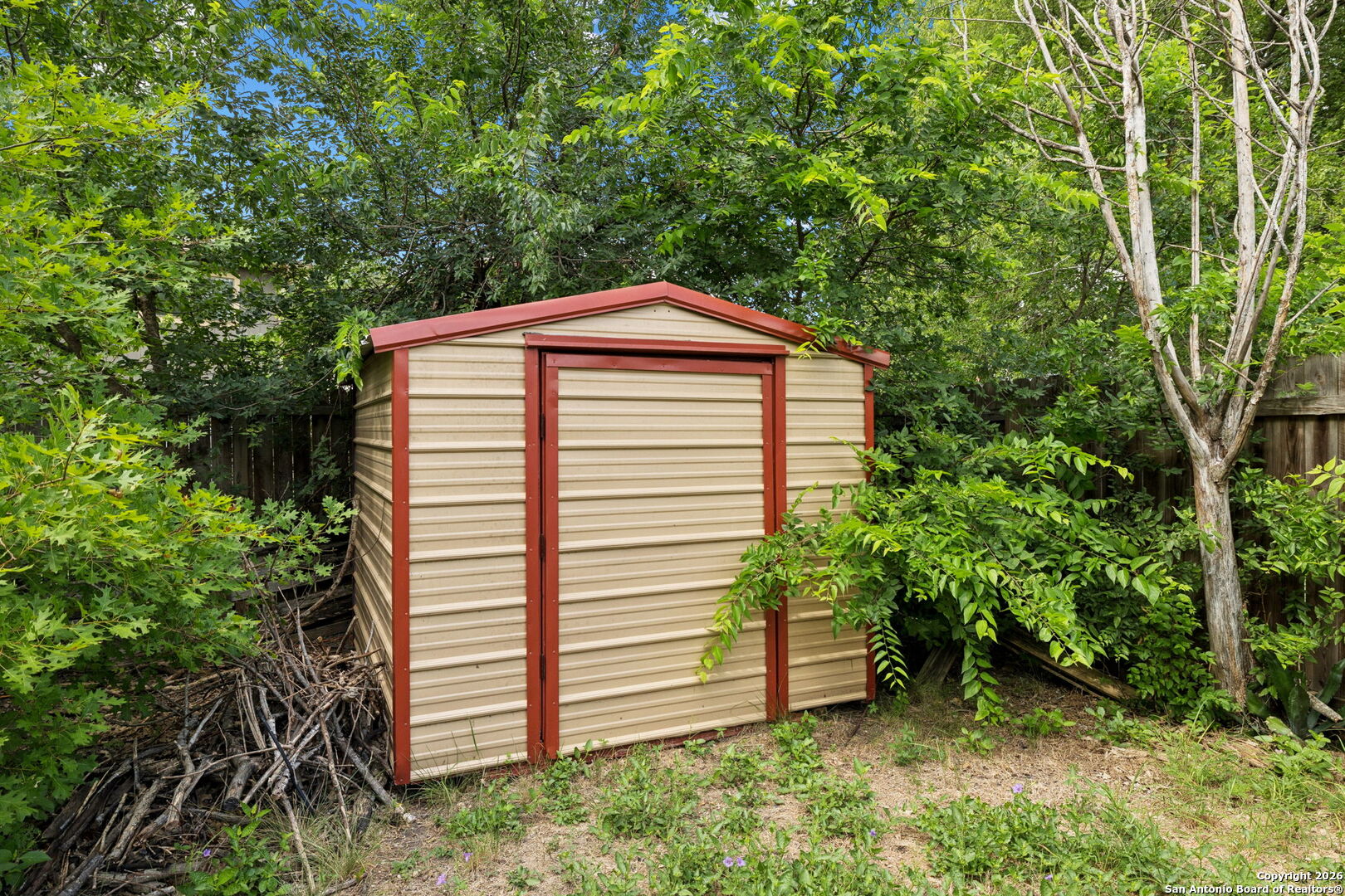 6622 Evenridge Lane San Antonio, TX 78239 - Photo 21 of 21 a front view of a house with a garden