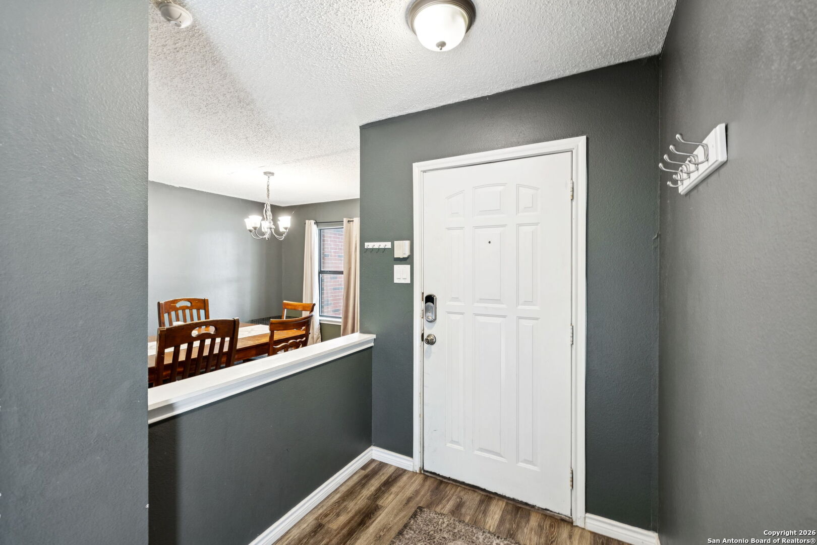 6622 Evenridge Lane San Antonio, TX 78239 - Photo 5 of 21 a kitchen with a sink and a refrigerator