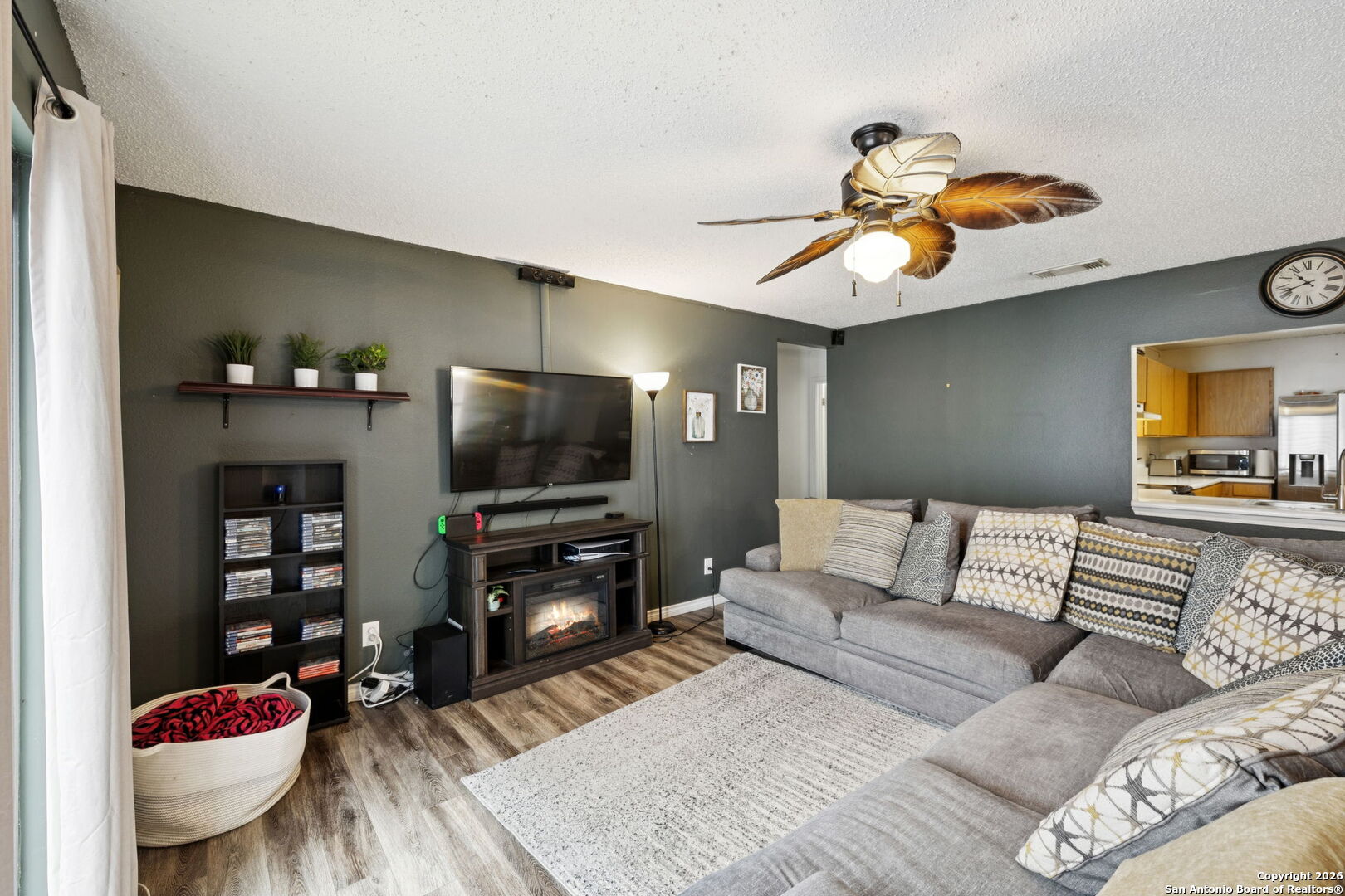 6622 Evenridge Lane San Antonio, TX 78239 - Photo 8 of 21 a living room with furniture and a flat screen tv