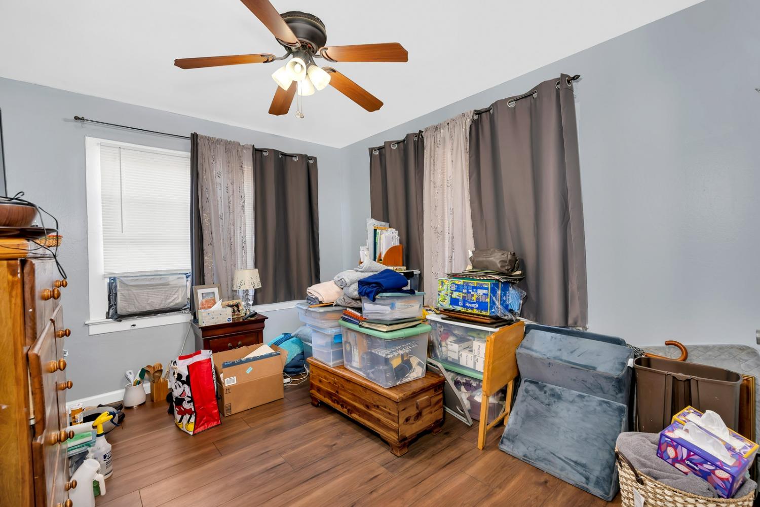 1164 J Street Reedley, CA 93654 - Photo 35 of 43 a living room with furniture and wooden floor