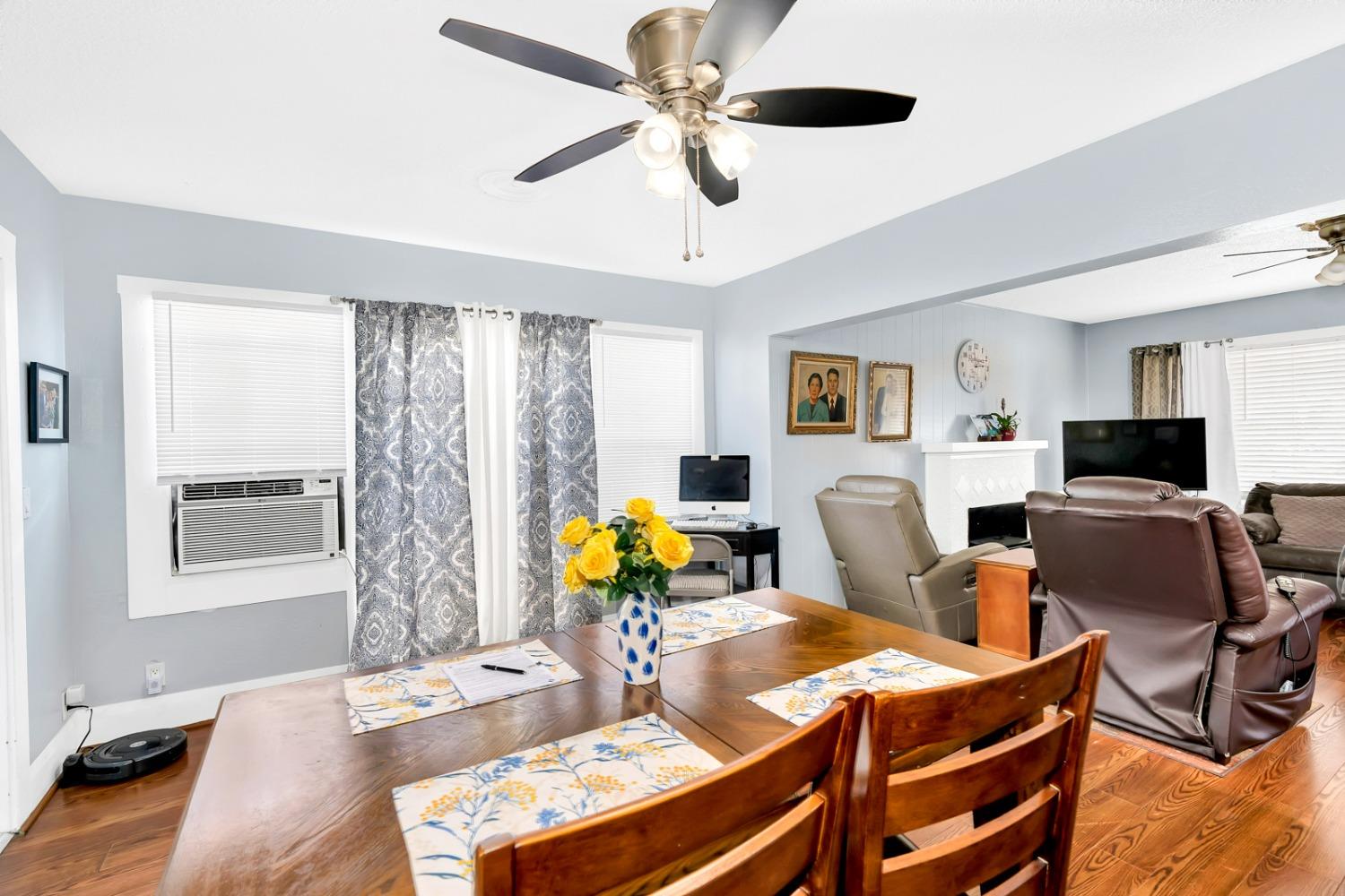 1164 J Street Reedley, CA 93654 - Photo 38 of 43 a view of a dining room with furniture