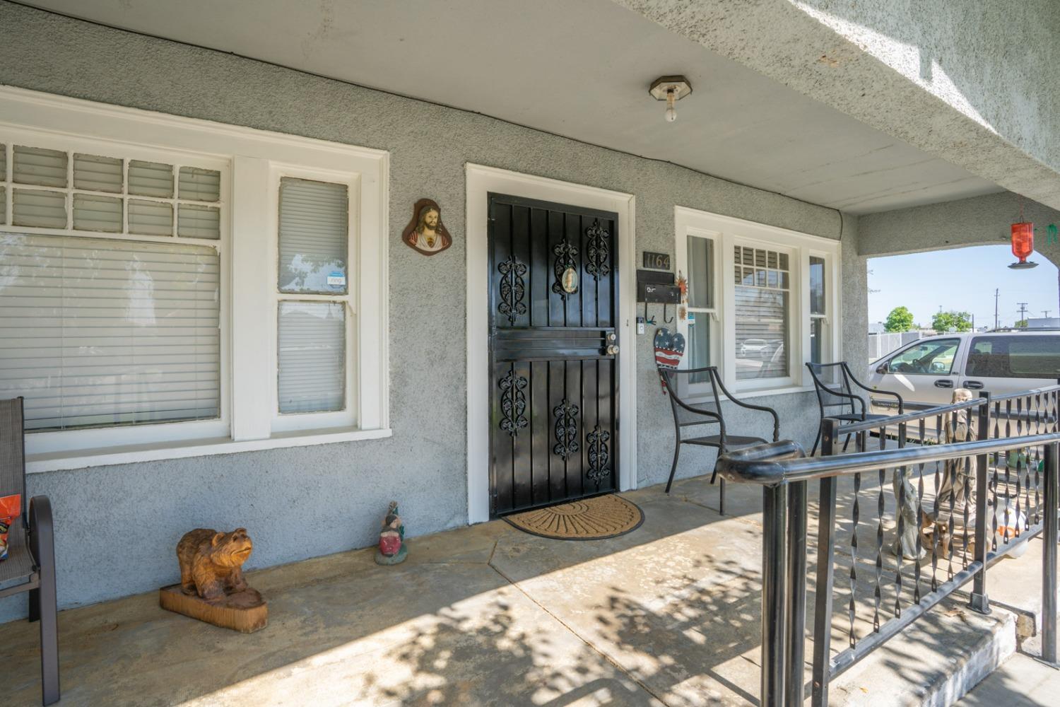 1164 J Street Reedley, CA 93654 - Photo 7 of 43 a balcony view with a seating space