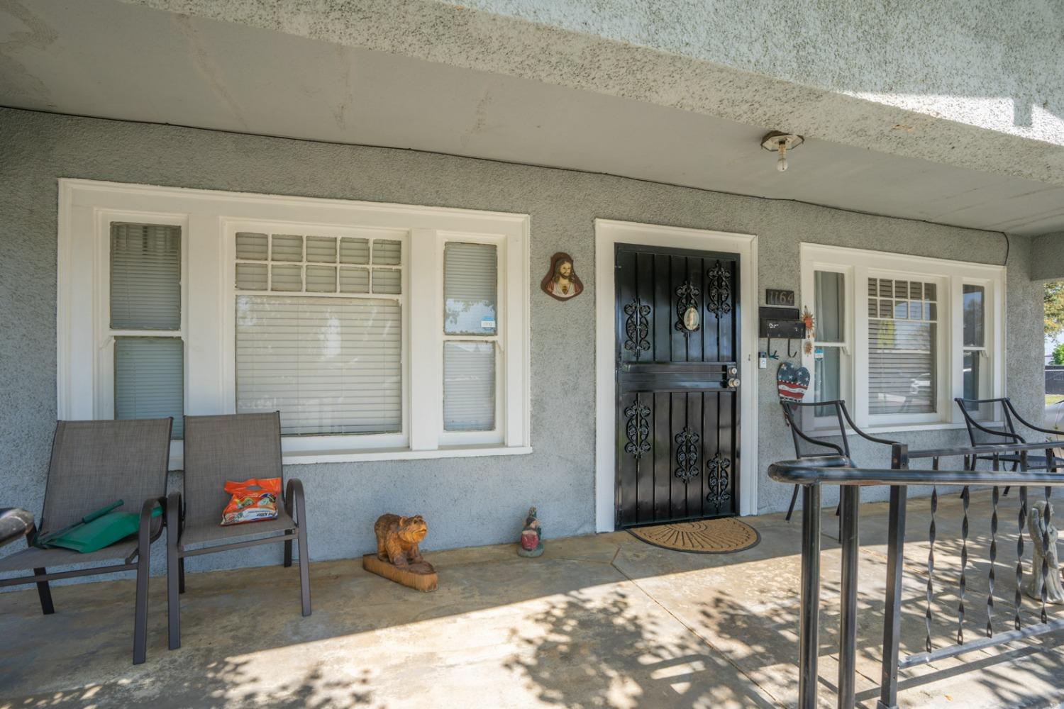 1164 J Street Reedley, CA 93654 - Photo 8 of 43 a backyard of a house with seating space