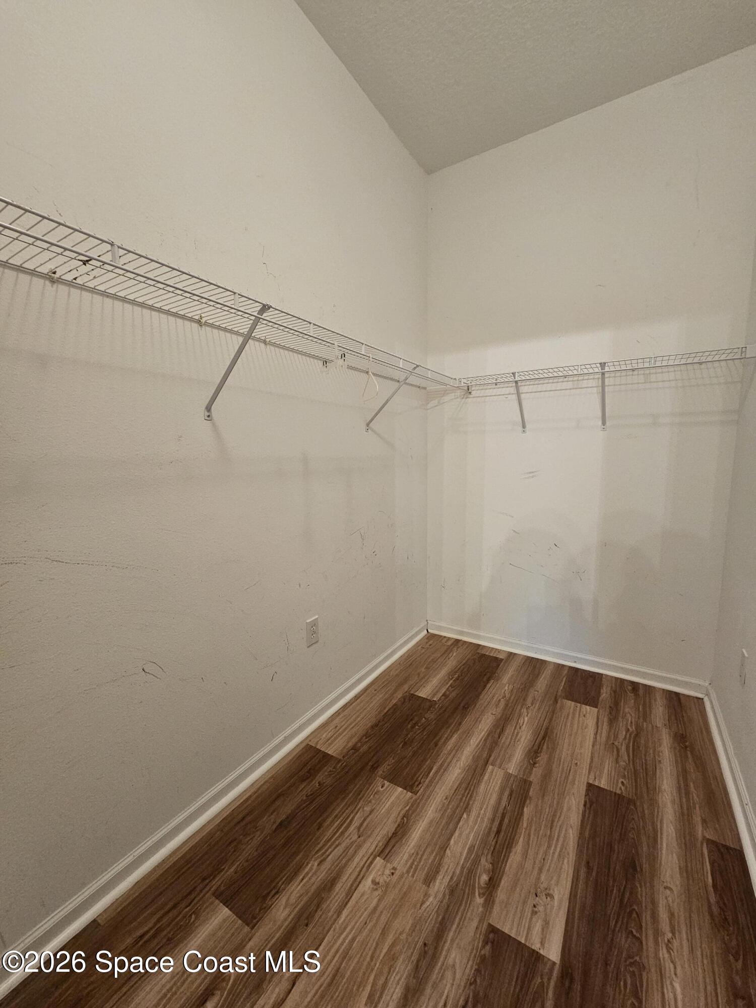 4056 Meander Place, Unit 104 Rockledge, FL 32955 - Photo 11 of 12 Master Bedroom Closet