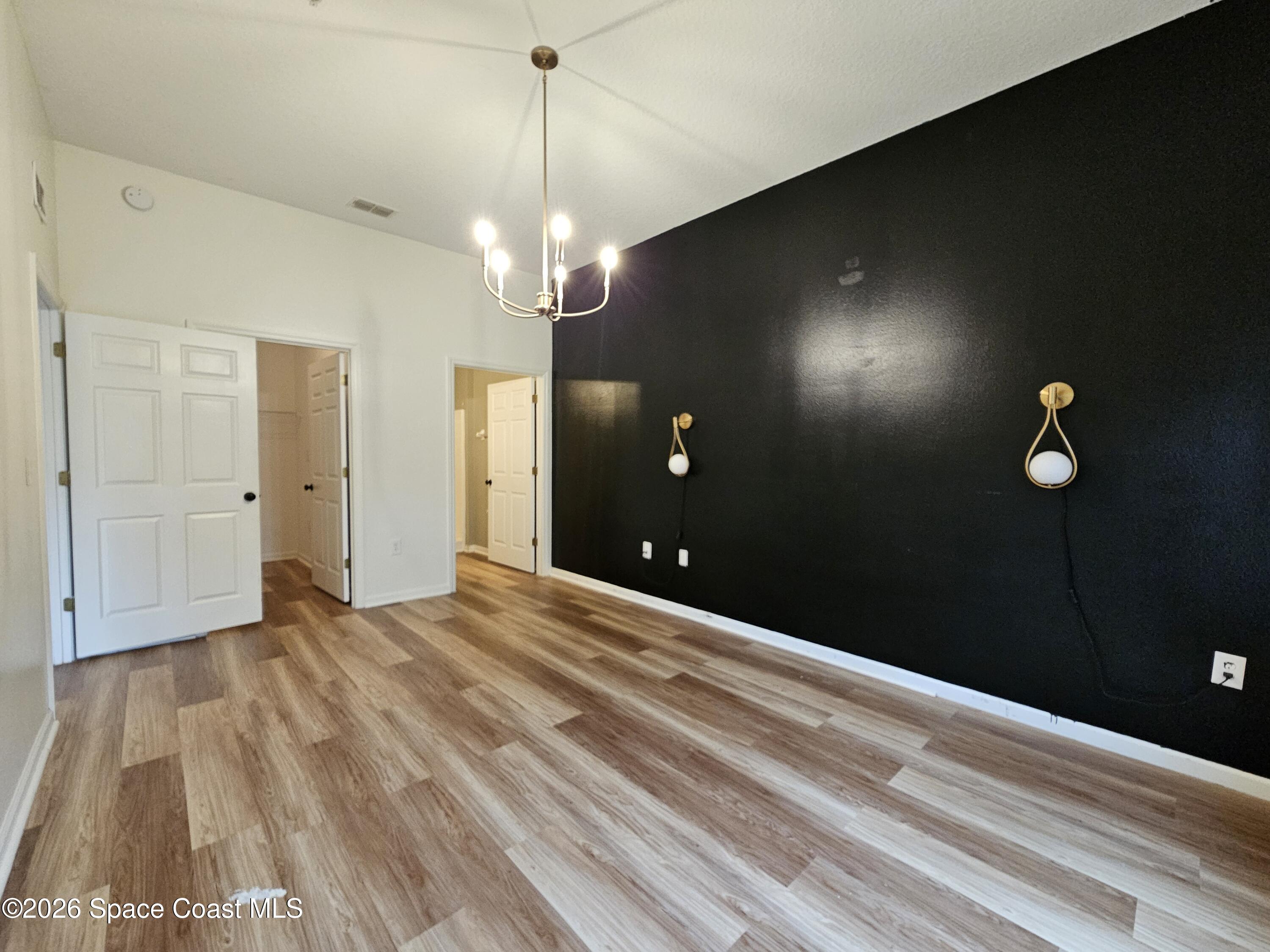 4056 Meander Place, Unit 104 Rockledge, FL 32955 - Photo 8 of 12 Master Bedroom