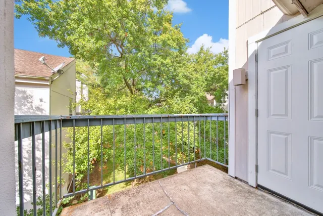 a view of a balcony with lake view