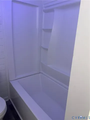 a bathroom with a bathtub