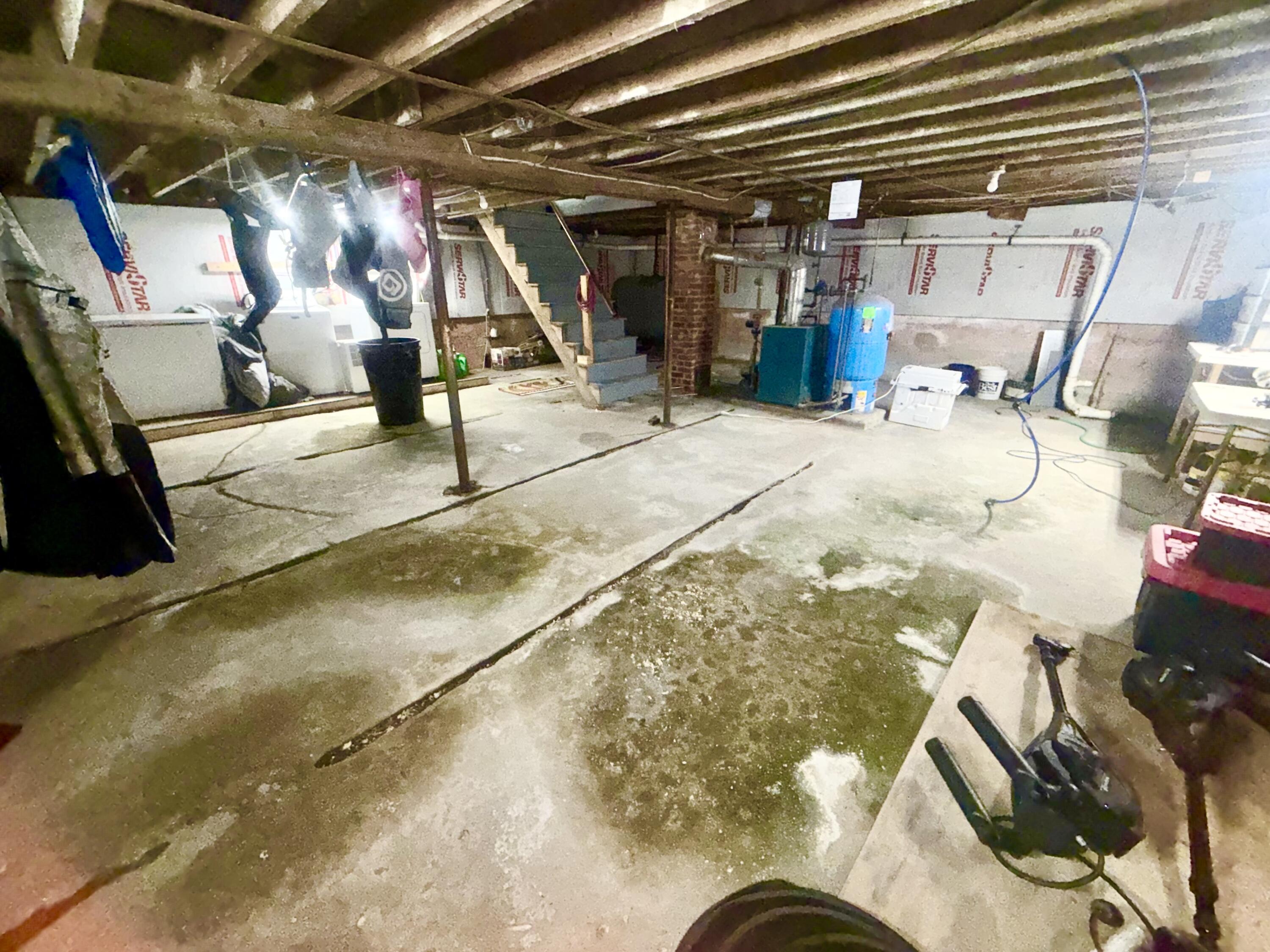 14 Pinkham Street Lincoln, ME 04457 - Photo 45 of 55 Full Concrete Basement