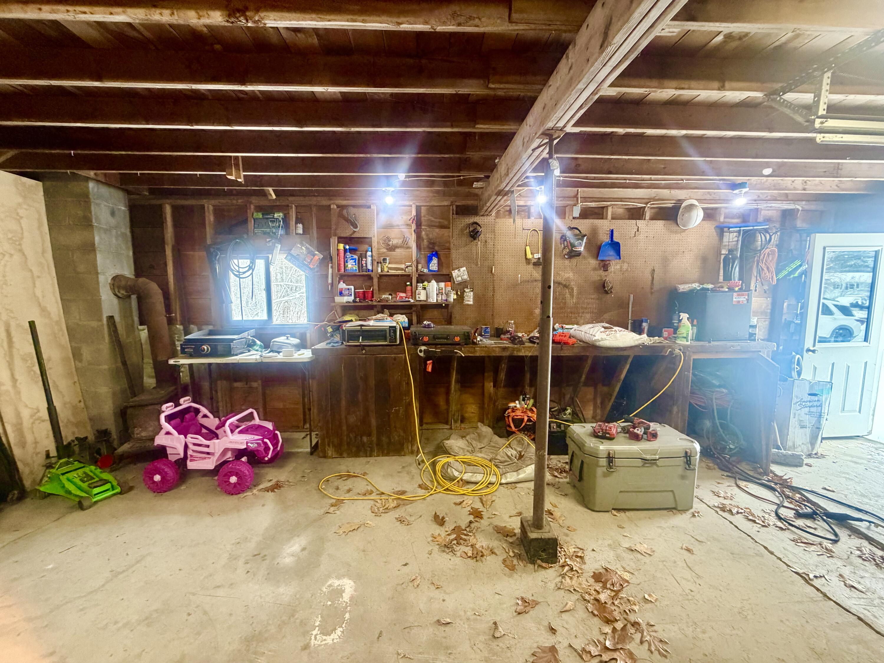 14 Pinkham Street Lincoln, ME 04457 - Photo 51 of 55 Workbench in Garage