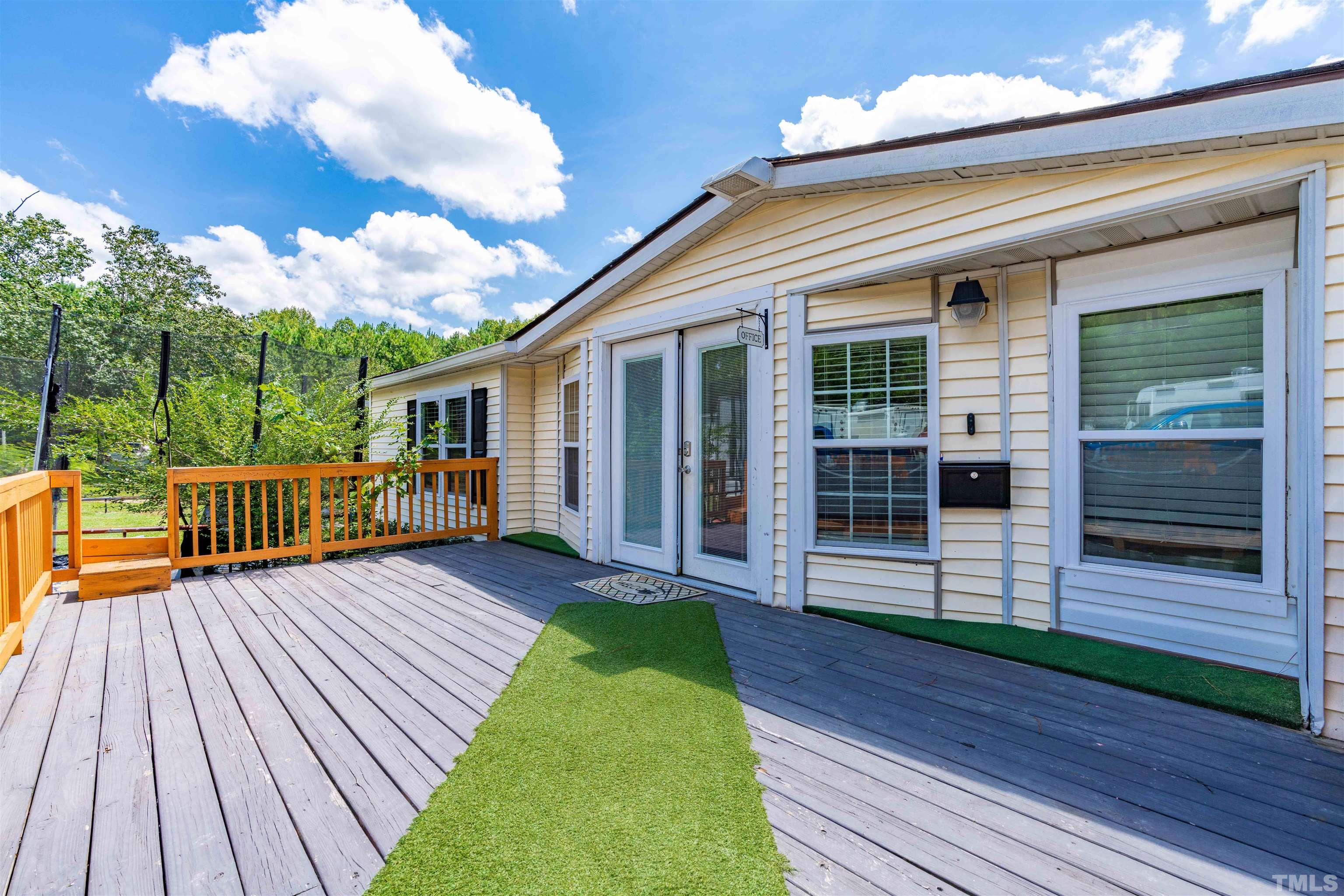 407 David Road Wendell, NC 27591 - Photo 2 of 39 a view of a house with a yard