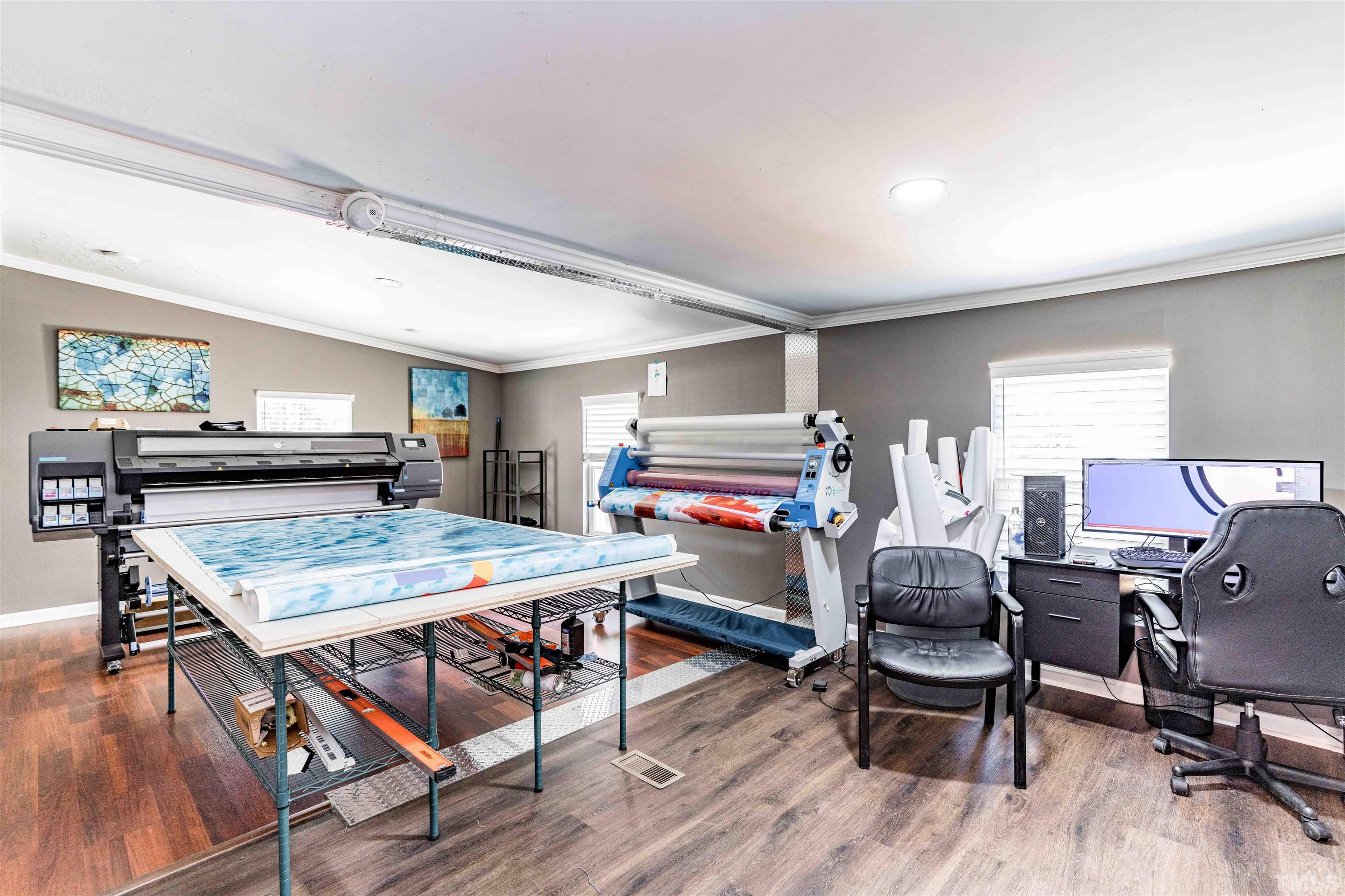 407 David Road Wendell, NC 27591 - Photo 21 of 39 a dining room with furniture and wooden floor