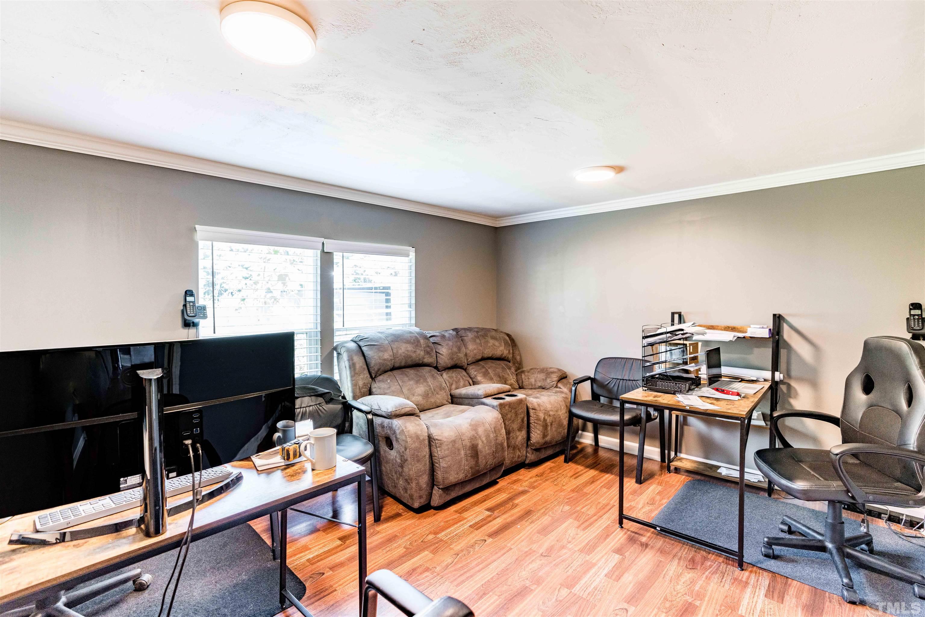 407 David Road Wendell, NC 27591 - Photo 3 of 39 a living room with furniture