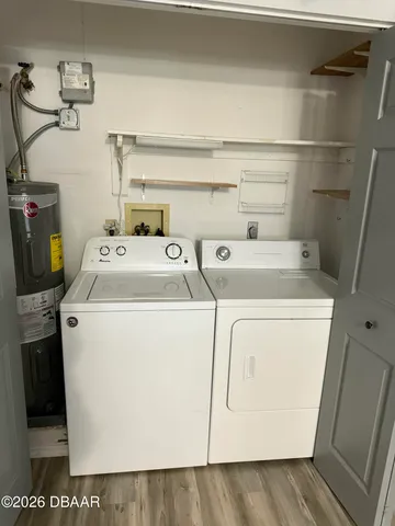 a utility room with dryer and washer