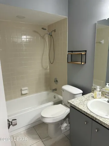 a bathroom with a toilet sink shower and bathtub