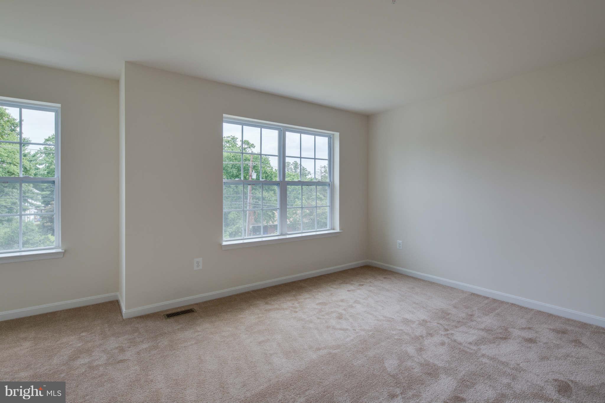 4 Hanover Road Hanover, MD 21076 - Photo 14 of 30 an empty room with windows