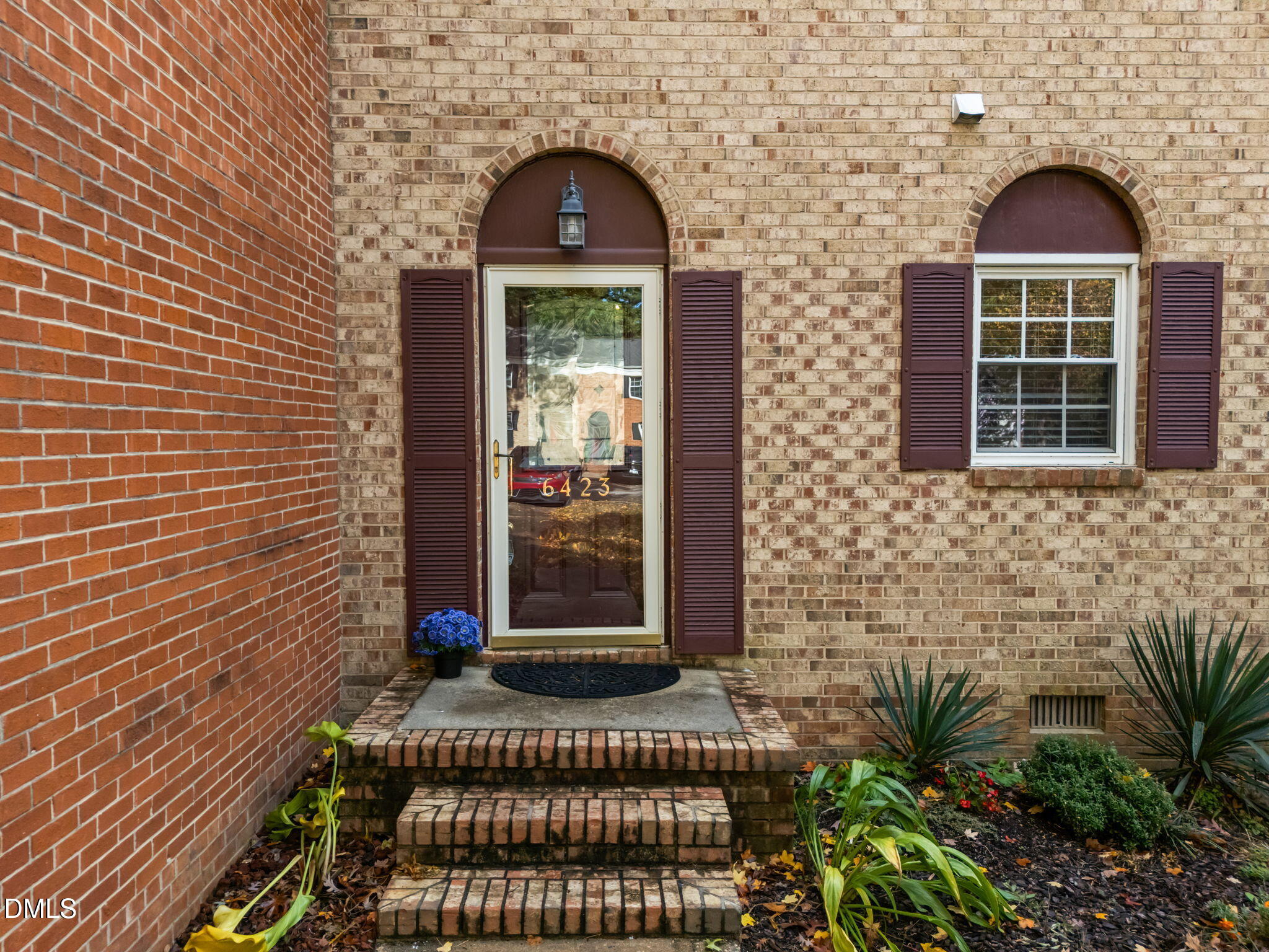 6423 New Market Way Raleigh, NC 27615 - Photo 23 of 33 a front view of a house with a yard