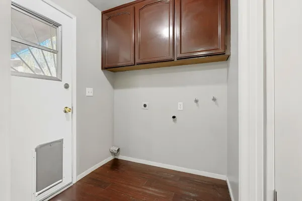 a view of cabinets and window