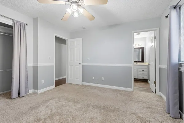 an empty room with a bathroom