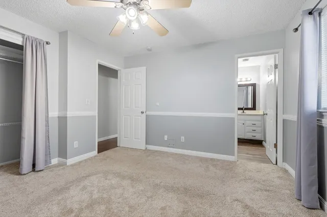 an empty room with a bathroom