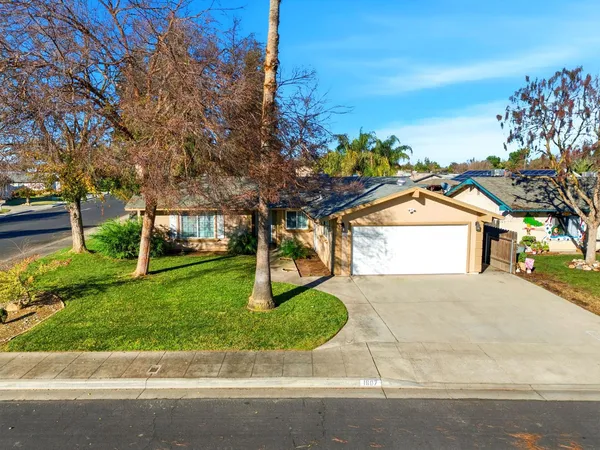 front view of a house with a yard