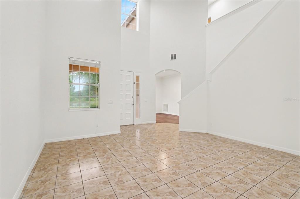 4819 Indian Deer Road Windermere, FL 34786 - Photo 3 of 30 an empty room with windows