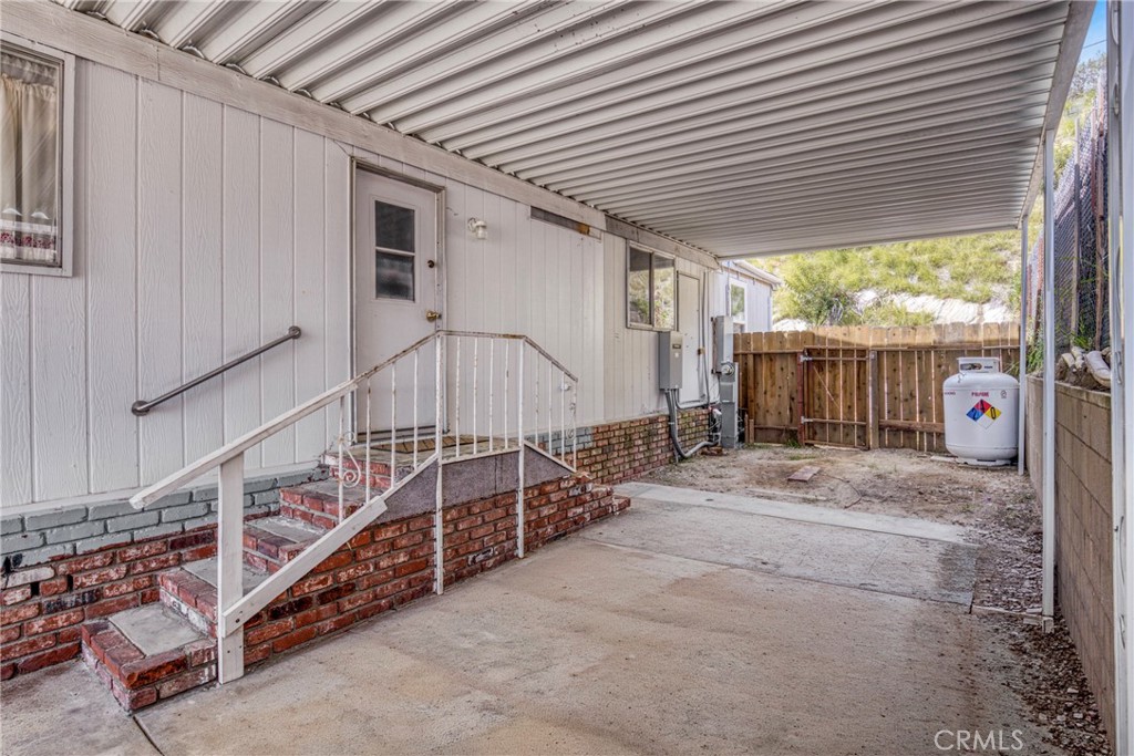 24425 Woolsey Canyon Road, Unit 5 West Hills, CA 91304 - Photo 11 of 17 a view of backyard with deck and outdoor space