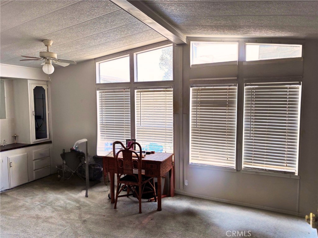 24425 Woolsey Canyon Road, Unit 5 West Hills, CA 91304 - Photo 16 of 17 a view of a workspace with furniture and a window
