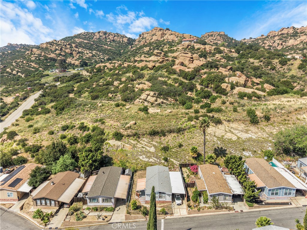 24425 Woolsey Canyon Road, Unit 5 West Hills, CA 91304 - Photo 6 of 17 an aerial view of residential houses with outdoor space