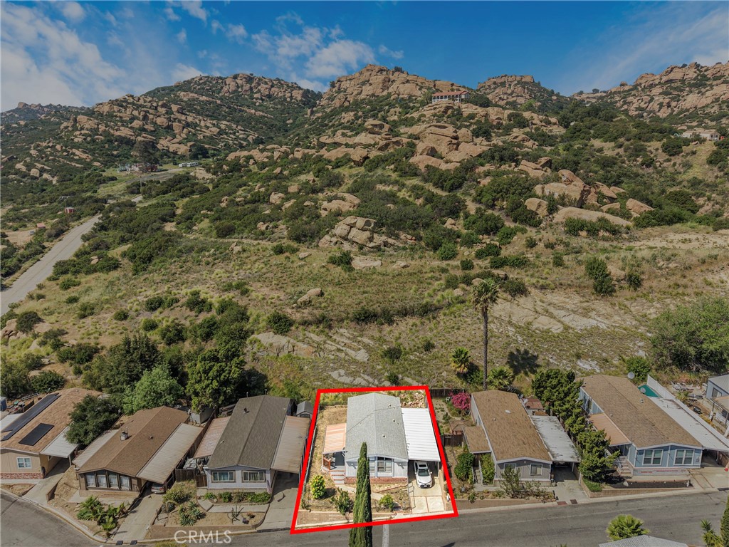 24425 Woolsey Canyon Road, Unit 5 West Hills, CA 91304 - Photo 7 of 17 an aerial view of residential houses with outdoor space