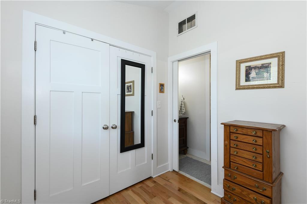 7164 Ludgate Road Gibsonville, NC 27249 - Photo 20 of 50 Closet and ensuite bathroom entry