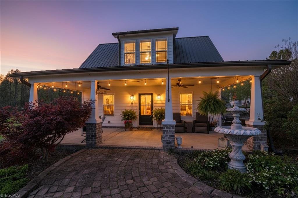 7164 Ludgate Road Gibsonville, NC 27249 - Photo 26 of 50 Front of cottage- dusk