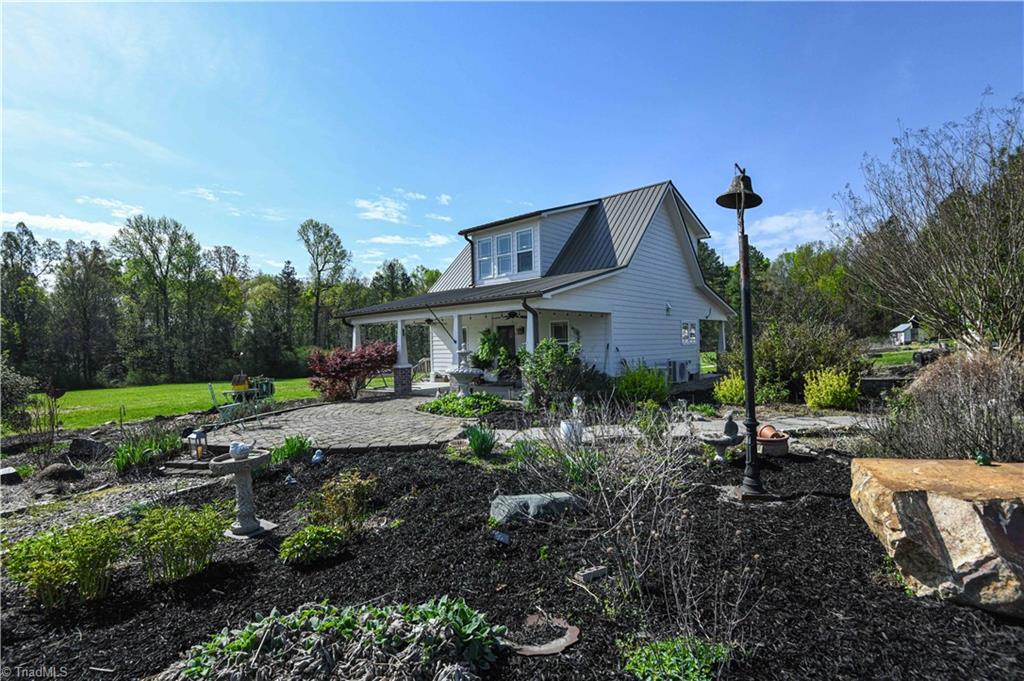 7164 Ludgate Road Gibsonville, NC 27249 - Photo 2 of 50 Cottage - ext view from driveway
