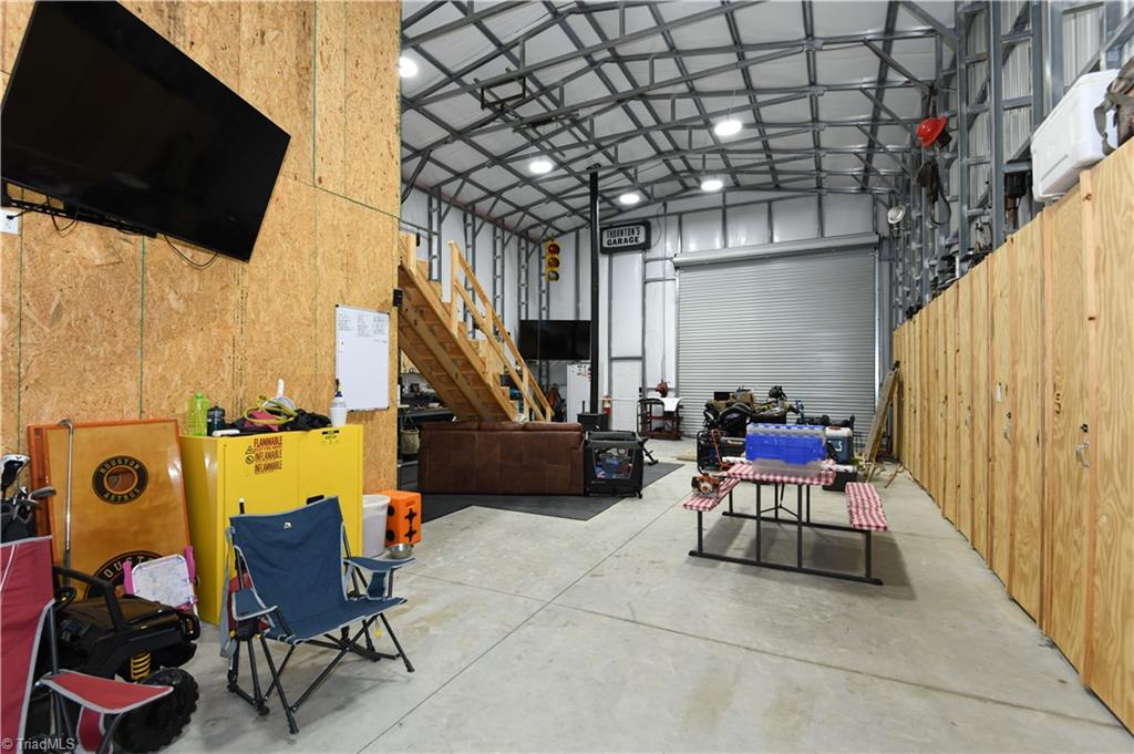 7164 Ludgate Road Gibsonville, NC 27249 - Photo 30 of 50 Main workshop space