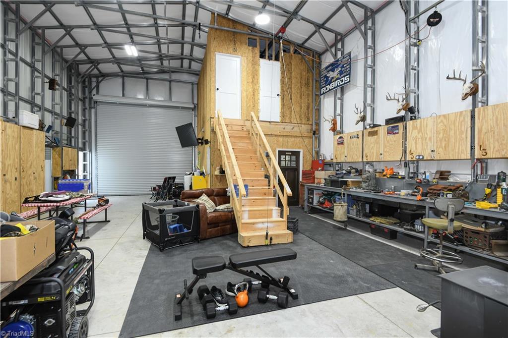 7164 Ludgate Road Gibsonville, NC 27249 - Photo 31 of 50 stairs can be raised/stowed